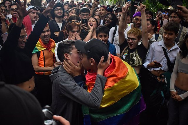 Hundreds of people demonstrate in Bogotá in protest against the assault on a gay couple