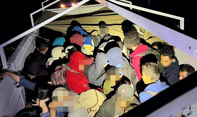266 migrants found crammed into the double bottoms of three trucks in northern Mexico