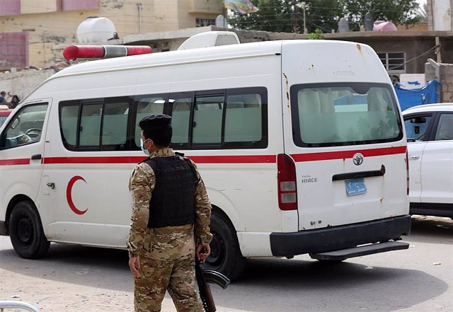 An American is shot dead in an attack on his vehicle in central Baghdad