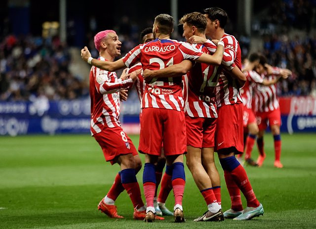 Griezmann directs Atlético to the round of 16