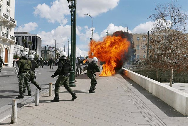 Riots between police officers and protesters following a protest over the response to the train crash in Greece