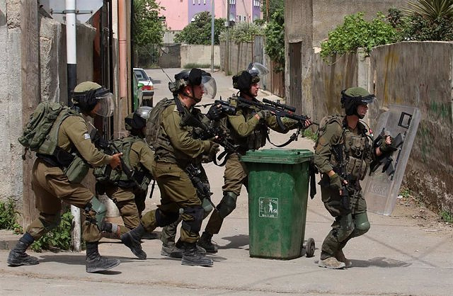 A Palestinian teenager is shot dead by Israeli soldiers in the West Bank
