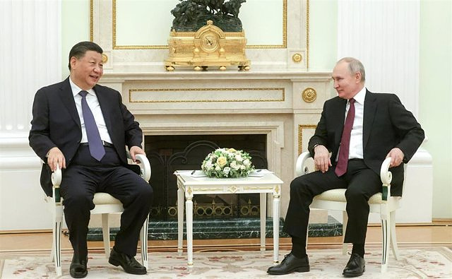 Xi invites Putin to visit China this year to strengthen relations