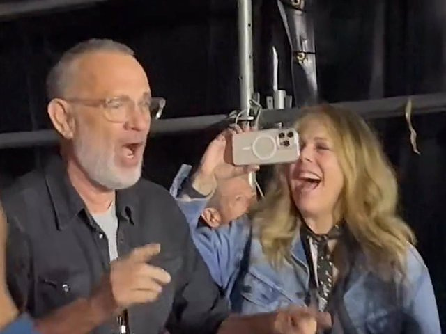 Tom Hanks and Rita Wilson give it their all at the Bruce Springsteen concert in Barcelona