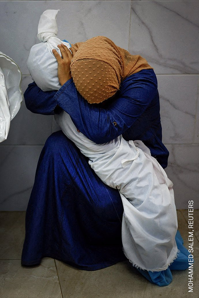 The image of a Palestinian woman hugging the deceased body of her niece wins the World Press Photo 2024