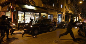 Two men are killed in a shooting at an Athens cafe