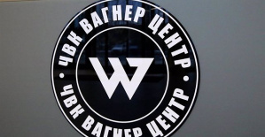 The Wagner Group says its forces have "virtually surrounded" the city of Bakhmut in eastern Ukraine.