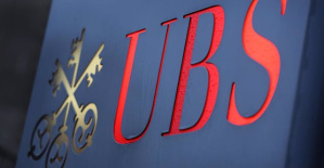 UBS earned 931 million until March, 52% less
