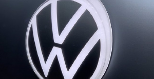 Volkswagen reduced its profit by almost...